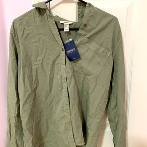 Green button up shirt